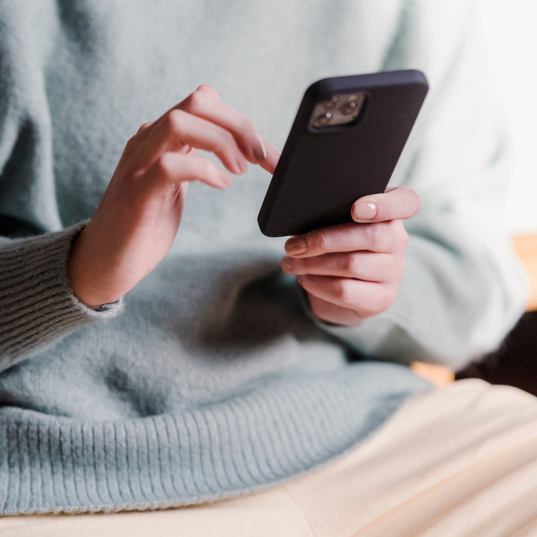 woman using her phone