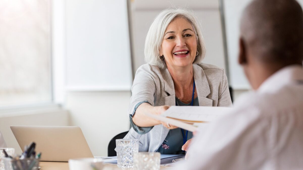 A hospital administrator meeting with an auditor