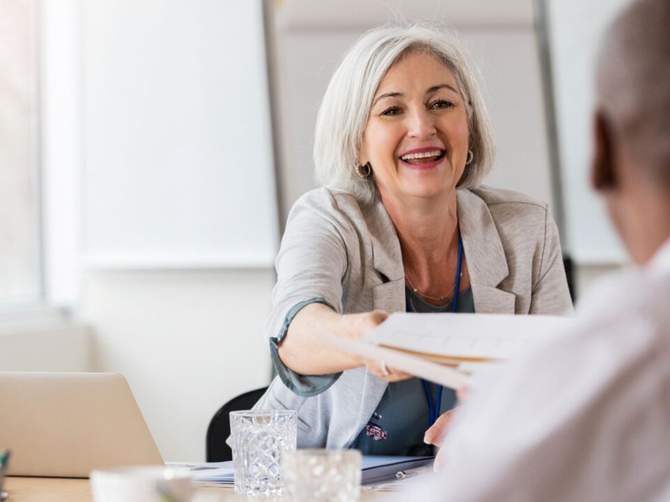 A hospital administrator meeting with an auditor