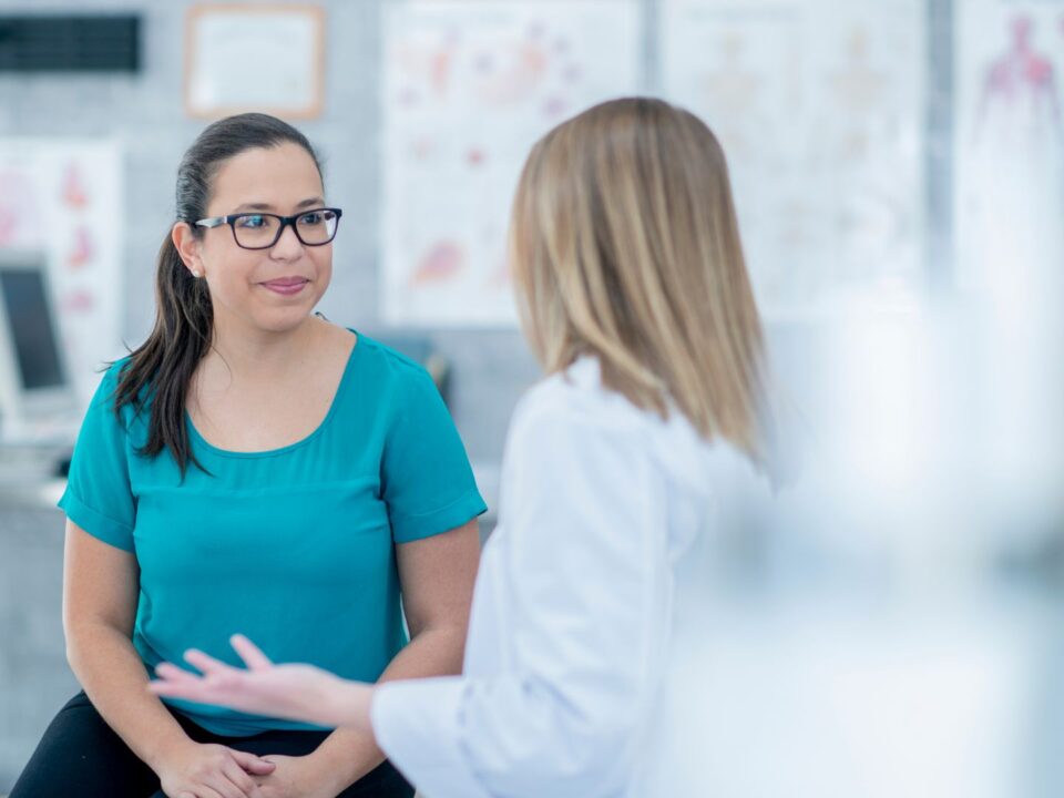 A patient speaking with a doctor